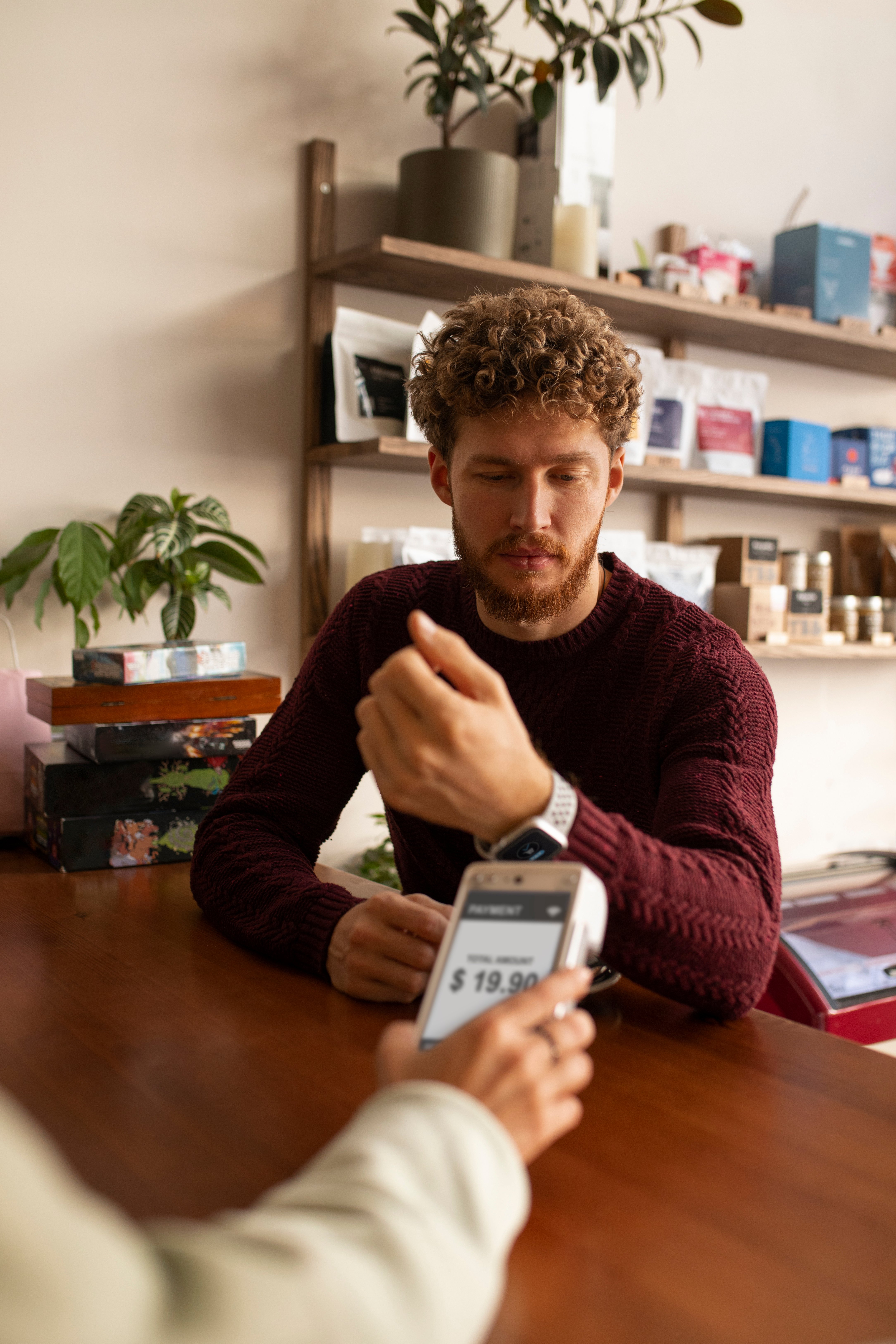 person-paying-bill-restaurant-using-nfc-technology